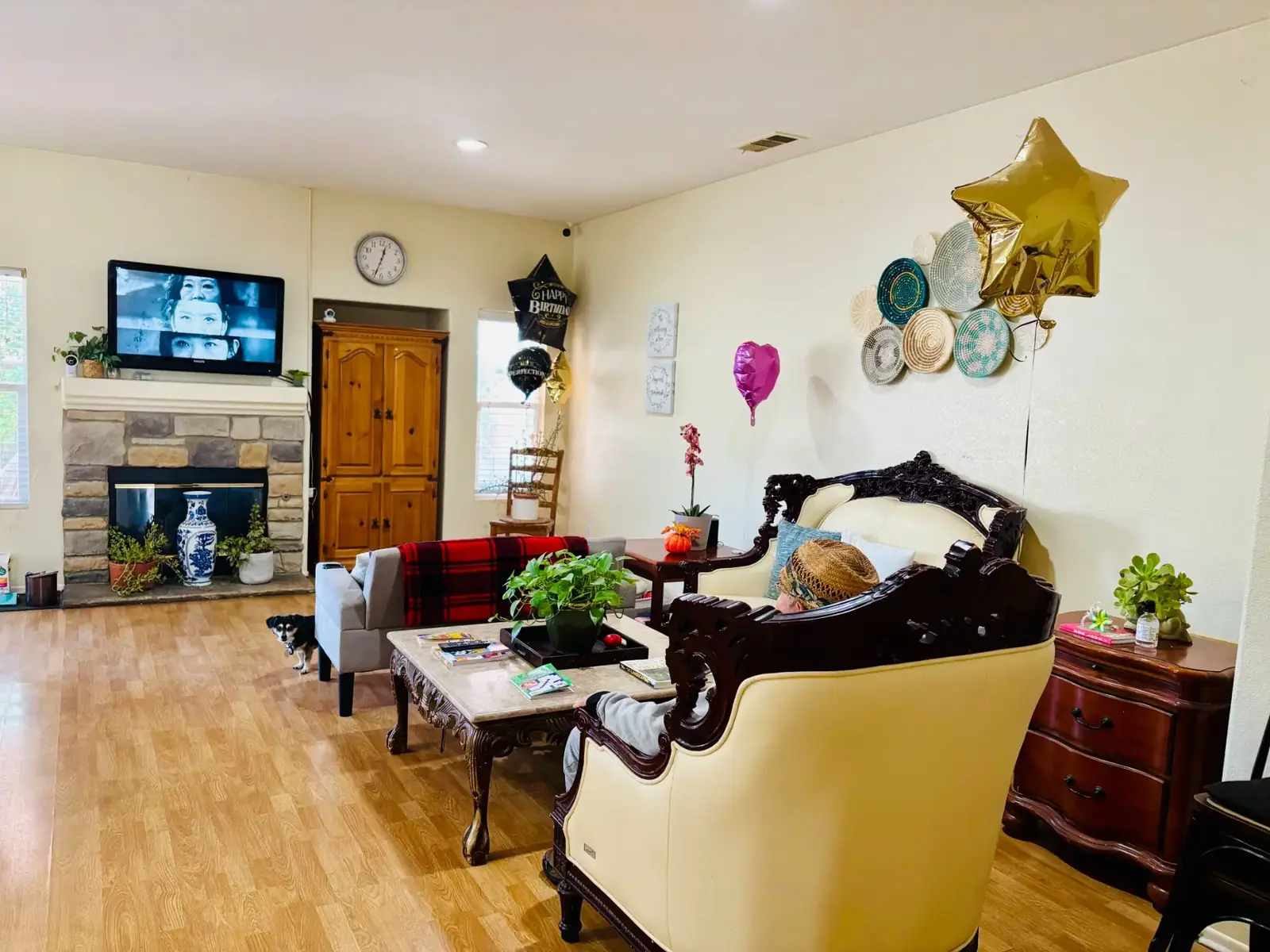 Bright shared living room with fireplace and comfortable seating at 2044 West Care Manor